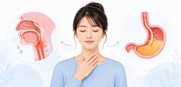 風邪が原因か、胃腸の不調によってか、嘔吐の原因を考える女性